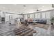 Open-concept living room with sleek, modern design and ample natural light at 7354 Strutting Silver Ct, Las Vegas, NV 89131