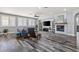 Bright living room with stylish furniture and cozy fireplace at 7354 Strutting Silver Ct, Las Vegas, NV 89131