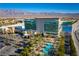 Stunning aerial view of the Aliante Casino and Hotel with mountain views and nearby amenities at 7849 Lily Trotter St, North Las Vegas, NV 89084