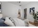 Bedroom featuring a closet, modern artwork, and access to the kitchen at 7849 Lily Trotter St, North Las Vegas, NV 89084