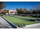 Outdoor bocce ball court with shade structures and benches at 7849 Lily Trotter St, North Las Vegas, NV 89084