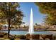 Beautiful view of the community fountain, landscaping, and shopping center at 7849 Lily Trotter St, North Las Vegas, NV 89084
