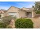 Inviting single-story home featuring desert landscaping and a well-kept front yard on a sunny day at 7849 Lily Trotter St, North Las Vegas, NV 89084