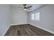 Bright, carpetless bedroom with window and modern ceiling fan at 8073 Villa Pulido St, Las Vegas, NV 89131