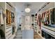 Large walk-in closet with custom shelving and a chandelier at 8073 Villa Pulido St, Las Vegas, NV 89131