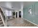 Spacious entryway with staircase, modern design elements, and wood-look floors at 8073 Villa Pulido St, Las Vegas, NV 89131