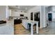 Stylish kitchen featuring an island with seating and modern appliances at 8073 Villa Pulido St, Las Vegas, NV 89131
