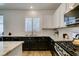 Elegant kitchen with granite counters, stainless steel appliances, and ample cabinet space at 8073 Villa Pulido St, Las Vegas, NV 89131