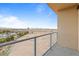 Enjoy the expansive desert views from this condo's private balcony with glass railing at 8255 Las Vegas Blvd # 802, Las Vegas, NV 89123