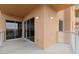 A large balcony with glass railing and sliding glass doors to indoor living area at 8255 Las Vegas Blvd # 802, Las Vegas, NV 89123