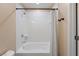 This bright bathroom has a shower-tub combination and a tiled shower surround at 8255 Las Vegas Blvd # 802, Las Vegas, NV 89123