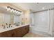 Bright bathroom with double sink vanity, shower and tub combination, and great lighting at 8255 Las Vegas Blvd # 802, Las Vegas, NV 89123