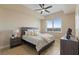Relax in this comfortable bedroom with ceiling fan, natural light, and mountain views at 8255 Las Vegas Blvd # 802, Las Vegas, NV 89123