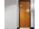 A nice, wooden entry door with gold-colored number 802 at 8255 Las Vegas Blvd # 802, Las Vegas, NV 89123