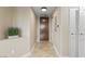 Hallway with tiled floors and access to a white door on the right at 8255 Las Vegas Blvd # 802, Las Vegas, NV 89123