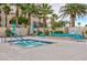 A luxurious outdoor spa is accompanied by plush seating and an inviting outdoor fireplace at 8255 Las Vegas Blvd # 802, Las Vegas, NV 89123