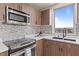 Close up of modern kitchen with new appliances and stylish backsplash at 8255 Las Vegas Blvd # 802, Las Vegas, NV 89123