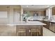 Modern kitchen boasts a large island, stainless appliances, and stylish backsplash at 8255 Las Vegas Blvd # 802, Las Vegas, NV 89123
