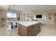 Kitchen island with marble countertops and stylish cabinets at 8255 Las Vegas Blvd # 802, Las Vegas, NV 89123