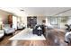 Common lounge area with seating, bookcase, and workspace at 8255 Las Vegas Blvd # 802, Las Vegas, NV 89123