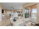 Bright home office with an open concept view of the kitchen and balcony at 8255 Las Vegas Blvd # 802, Las Vegas, NV 89123