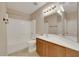 Bathroom with single sink vanity, shower over tub and good lighting at 8287 Lincoln Valley St, Las Vegas, NV 89123
