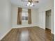 Bedroom features wood floors, ceiling fan and closet at 8287 Lincoln Valley St, Las Vegas, NV 89123