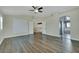 Expansive bedroom with vaulted ceilings, hardwood flooring, and en-suite bathroom at 8287 Lincoln Valley St, Las Vegas, NV 89123