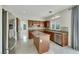 Spacious kitchen features stainless appliances, center island, and custom cabinetry at 8287 Lincoln Valley St, Las Vegas, NV 89123