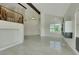 Elegant living room with tile flooring, staircase, and contemporary accents, perfect for gatherings at 8287 Lincoln Valley St, Las Vegas, NV 89123