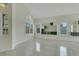 Spacious living room showcasing modern wall decor and tile flooring, creating a stylish and inviting area at 8287 Lincoln Valley St, Las Vegas, NV 89123