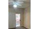 Cozy bedroom with a fan, and a sliding door with access to a patio at 830 Carnegie St # 1811, Henderson, NV 89052