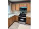 Modern kitchen featuring stainless steel appliances, including a gas range and microwave at 830 Carnegie St # 1811, Henderson, NV 89052