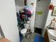 Functional bathroom featuring a shower with a curtain, toilet, and sink with towel racks for convenience at 890 Ripple Way, Las Vegas, NV 89110