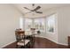Cozy dining nook with a round table set by bay windows, providing a sunlit space for meals at 8904 Marble Dr, Las Vegas, NV 89134