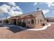 Charming home featuring desert landscaping, barrel tile roof, and mature trees at 8904 Marble Dr, Las Vegas, NV 89134