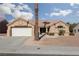 Charming single-story home with desert landscaping and a spacious two-car garage at 8904 Marble Dr, Las Vegas, NV 89134