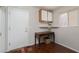 Small office space with wooden desk, storage and natural light creating functional and bright work area at 8904 Marble Dr, Las Vegas, NV 89134
