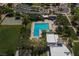 Aerial view of community pool with basketball court and ample green space at 8904 Marble Dr, Las Vegas, NV 89134