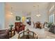 Open-concept living room with stylish furnishings and bright neutral walls at 1022 Atticus Ave, Henderson, NV 89015