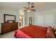 Vaulted ceilings accentuate a spacious main bedroom with connected main bath at 1022 Atticus Ave, Henderson, NV 89015