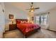 Spacious main bedroom features a ceiling fan and bright natural light at 1022 Atticus Ave, Henderson, NV 89015