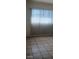 Apartment living room with vertical blinds at 1832 Lewis Ave, Las Vegas, NV 89101