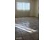 Apartment living room with tile floors and vertical blinds at 1832 Lewis Ave, Las Vegas, NV 89101