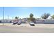 Apartment complex with off-street parking and palm trees for shade at 1832 Lewis Ave, Las Vegas, NV 89101