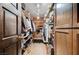 Spacious walk-in closet with custom shelving and organization system to accommodate an extensive wardrobe and accessories at 1905 Calle De Espana, Las Vegas, NV 89102