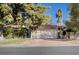Charming home featuring a two-car garage with brick driveway and mature landscaping at 1905 Calle De Espana, Las Vegas, NV 89102