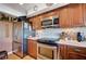 Efficient kitchen layout with modern appliances, a sleek cooktop, and ample counter space for meal preparation at 1905 Calle De Espana, Las Vegas, NV 89102