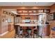 Modern kitchen featuring stainless steel appliances, a granite countertop island, and ample storage space at 1905 Calle De Espana, Las Vegas, NV 89102