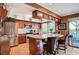 Beautiful kitchen with stainless steel appliances, a center island with a marble countertop, and ample cabinetry at 1905 Calle De Espana, Las Vegas, NV 89102